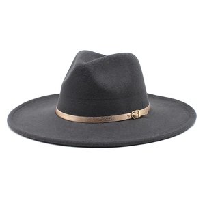 Close-up of charcoal grey wool fedora featuring a metallic rose gold belt and gold buckle