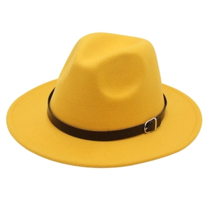 Detailed view of yellow fedora hat with felt texture and black leather belt buckle