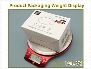 Weight display of baby PP drinking cup in packaging box showing 104.9g on scale