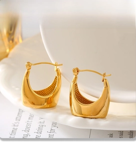 Detailed view of U-shaped gold plated earrings with a high-shine PVD finish