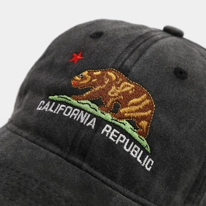 Detailed macro view of the California Republic bear embroidery on the vintage cotton cap
