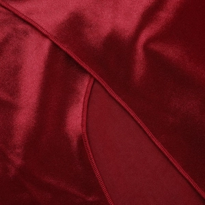 Detailed close-up of dark red satin fabric showing high-gloss texture and fine stitching
