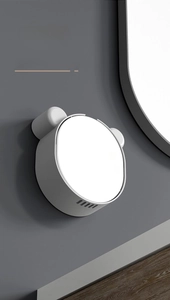 Close-up of bottom drainage holes on wall-mounted panda soap dish for quick drying