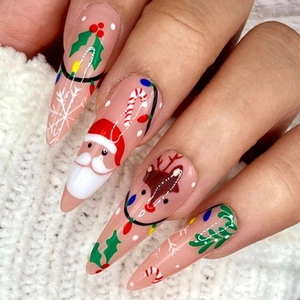 Long pointed Christmas fake nails with Santa, reindeer and snowflake patterns