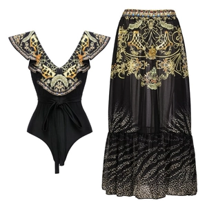 Detail of black V-neck swimsuit and baroque gold print chiffon maxi skirt set
