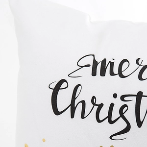 White Christmas pillowcase with black cursive text and elegant gold polka dots