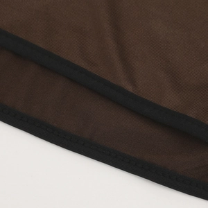 Close-up detail of breathable mesh fabric and stitching on brown cycling balaclava