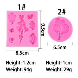 Pink silicone fondant molds featuring heart balloons, lips, and rose patterns for cake decor