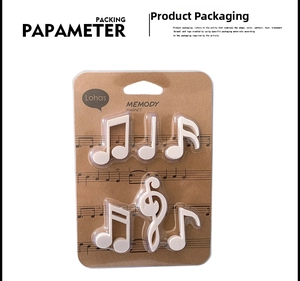 Detail of 6-piece music note magnets set in creative blister packaging with staff patterns