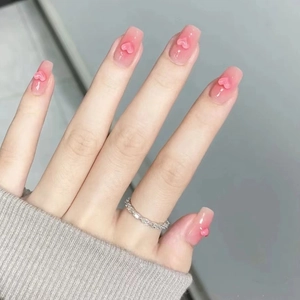 Pink heart-shaped 3D nail art charms with jelly texture and translucent finish