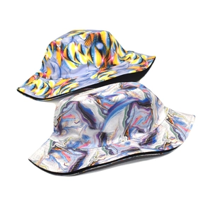 Reversible 3D print bucket hat featuring colorful tie-dye and marble patterns for sun protection