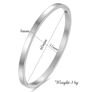 Detail showing 4mm width and dimensions of minimalist silver stainless steel cuff bracelet