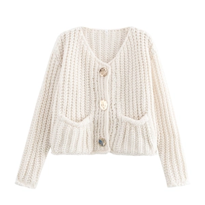 Close-up of knit cardigan texture with golden buttons and size M neck label detail