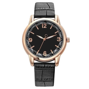 Elegant rose gold watch with black leather strap and minimalist numeric dial