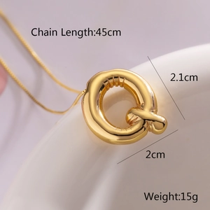Detail view of golden balloon letter Q pendant necklace with size measurements 2.1cm x 2cm
