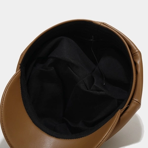 Brown PU leather octagonal baker boy hat showing interior lining and adjustable drawstring