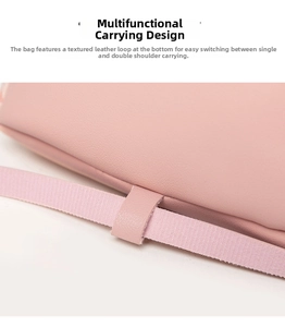 Detail of pink leather backpack featuring adjustable strap and bottom perforation structure
