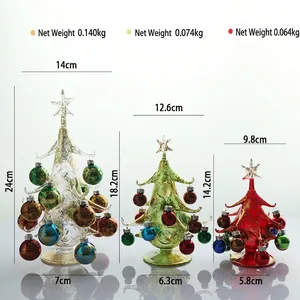 Three glass Christmas tree ornaments in red green and gold with miniature ball decorations