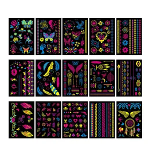 Set of 15 waterproof fluorescent arm tattoo stickers with butterfly and feather designs