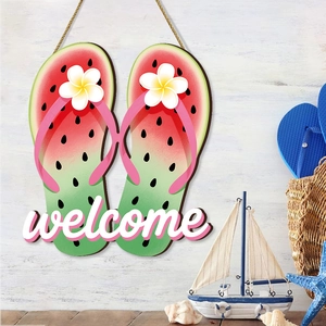 Watermelon flip-flop wooden welcome sign with summer beach decor and tropical plumeria