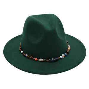 Detail of dark green felt fedora featuring bohemian colorful beaded trim and flat brim