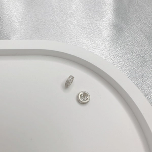 S925 silver micro-pave zircon wheel beads for DIY jewelry making on white plate