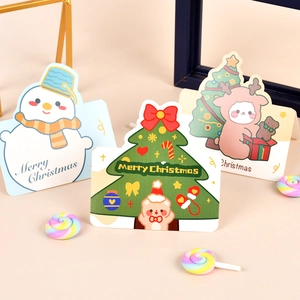 Three festive Christmas cards featuring snowman, tree, and reindeer cartoon designs