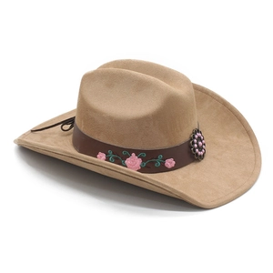 Detailed embroidery on western cowboy hat with floral leather band and pink bead buckle
