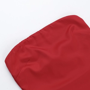 Detailed view of red satin mini dress featuring premium stitching and smooth fabric texture