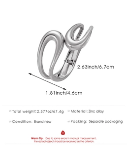 Detail showing dimensions of silver irregular alloy open bangle with 6.7cm x 4.6cm size