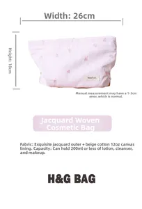 Pink heart embroidered striped cosmetic bag detail showing 26x18cm size and canvas lining