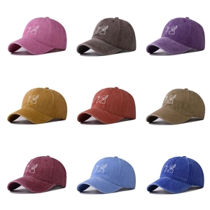 Collection of washed vintage baseball caps with palm tree embroidery in various colors