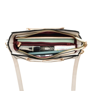 Modern off-white women handbag with top zipper and multiple spacious compartments