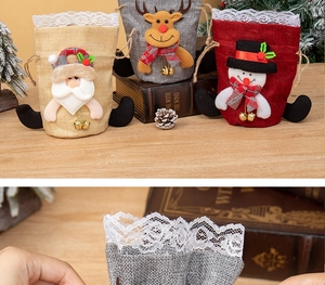 Detail of Christmas drawstring gift bags featuring Santa, Reindeer, and Snowman with lace trim