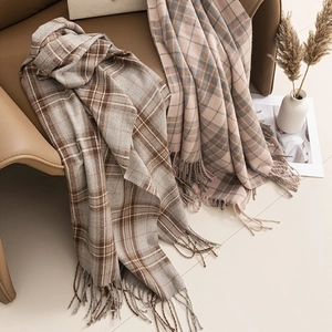 Soft checkered scarves in brown and pink plaid patterns with elegant fringe tassels