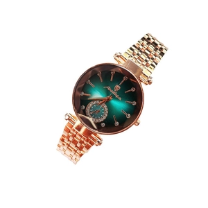 Elegant rose gold women's watch with deep green dial and crystal-studded bezel details