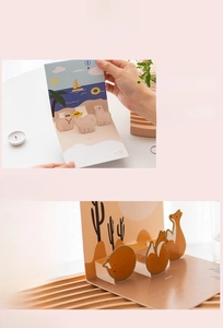 Detailed view of 3D pop-up cards with alpaca and fox motifs on soft pink background