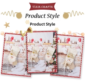 Detail of knitted Christmas stockings with Santa and Snowman plush decor for holiday gifting