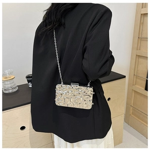 Chic metallic gold clutch bag with water ripple texture and fine metal chain strap