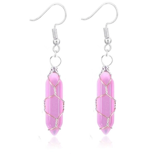 Macro detail of hexagonal pink quartz earrings with silver wire wrapping design