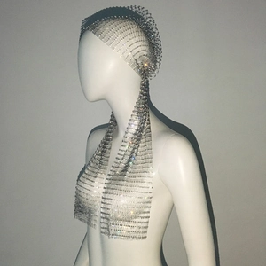 Detailed view of silver mesh headpiece with sparkling rhinestones for party wear