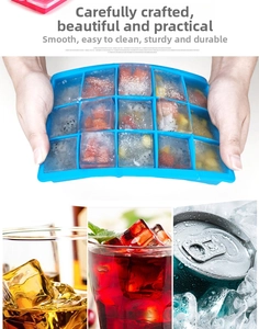 Detail of 15-grid blue silicone ice tray showing easy twist release of fruit ice cubes