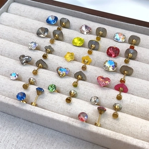 Sparkling crystal stud earrings in various colors and shapes with screw flat backs