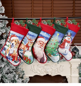 Set of 5 Christmas stockings with Santa, reindeer, and dog motifs hanging on a fireplace