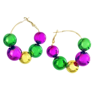 Hoop earrings with gold, green, and purple polished beads on a minimalist white background