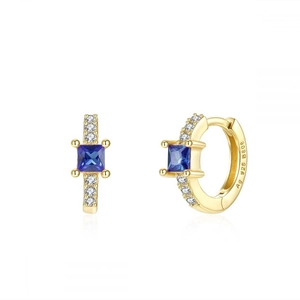 Macro detail of Ag 925 hallmark on gold plated hoop earrings with blue zircon stones