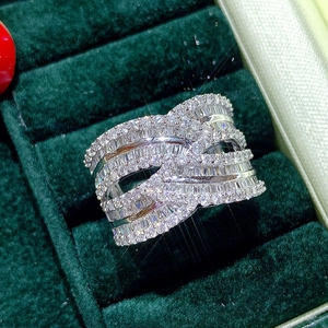 Luxurious criss-cross wide ring with baguette and round cubic zirconia in velvet box