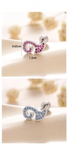 Macro detail of swirl-shaped stud earrings with pink and blue zircons, size 1.2cm x 0.65cm