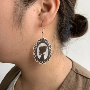 Gothic skull earrings with black and white Victorian cameo design on silver hooks