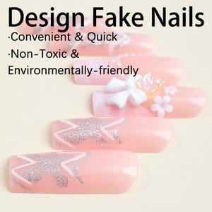 Pink French long press-on nails with 3D bows, silver stars, and floral nail art decorations